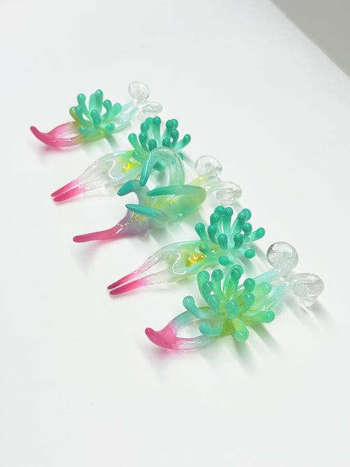 Flower nail art that inspired from coral, nautilus and ocean creatures.